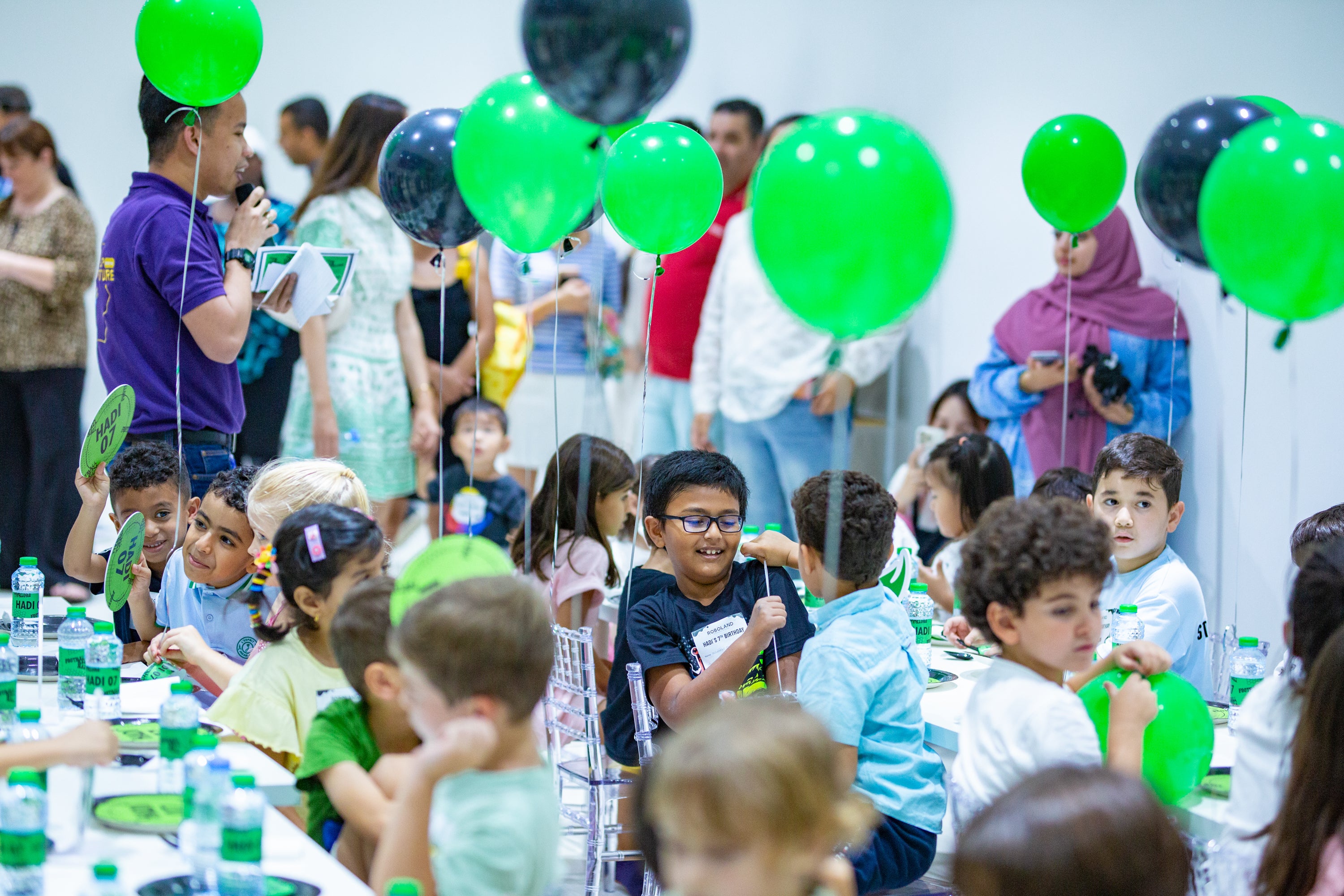 Birthday celebration fun with happy children in RoboLand's party halls, available for kids of all ages